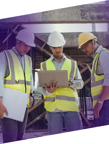 construction workers with laptop
