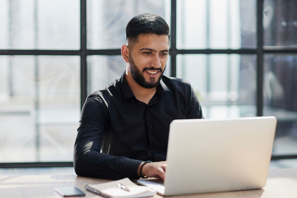 man working on laptop