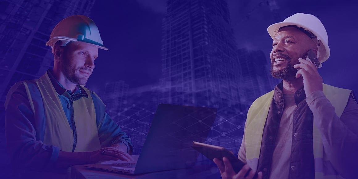 man on computer and man on cell phone using integrated digital delivery for construction projects